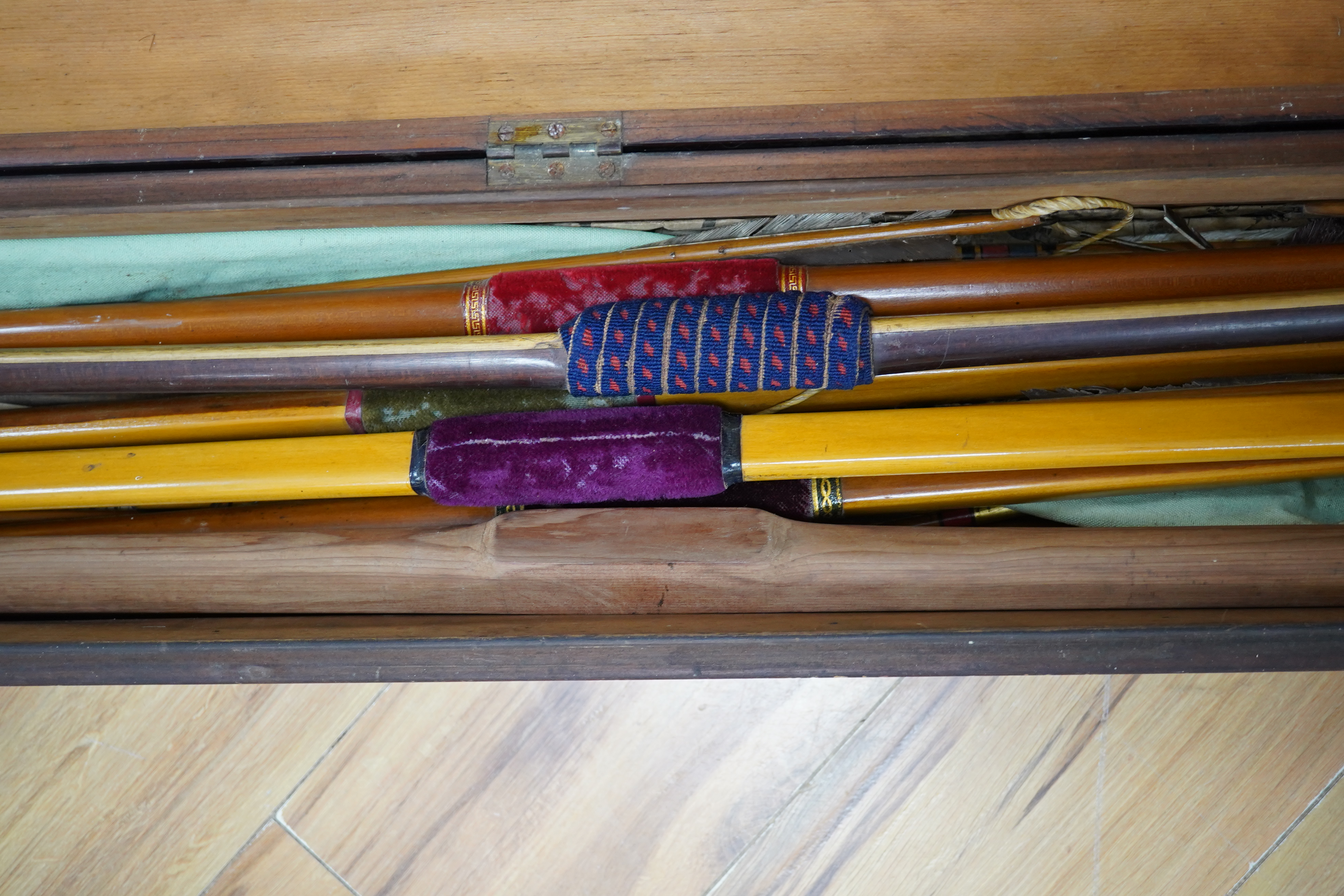 Five Victorian and later archery longbows, a blank for a longbow, and a selection of arrows, boxed. Condition - poor to good.